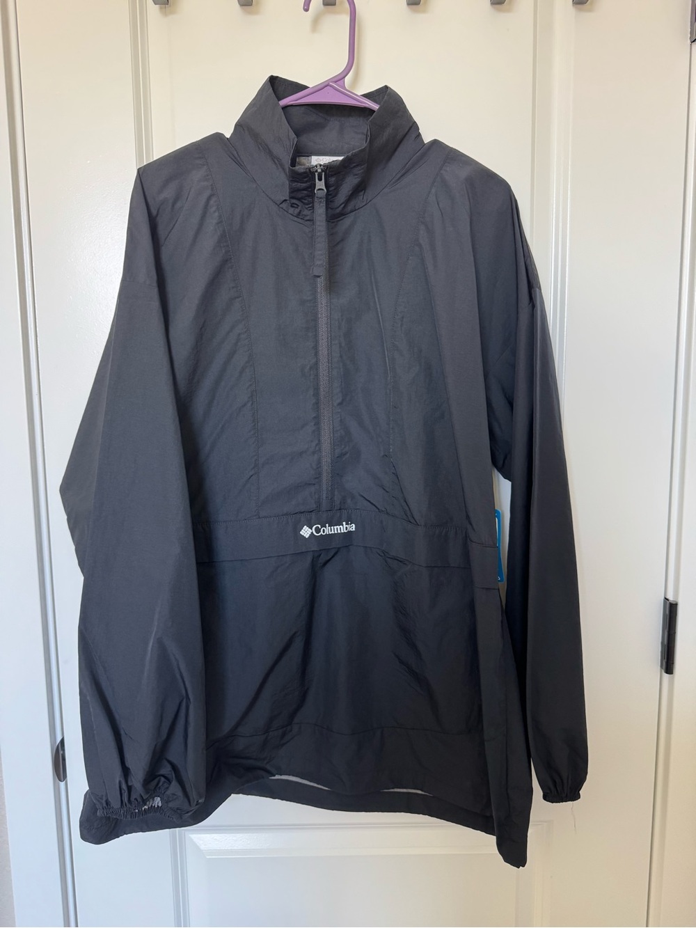Columbia women’s  Black Half-Zip Windbreaker or rain coat